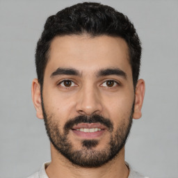 Neutral latino young-adult male with short  black hair and brown eyes