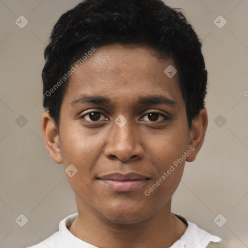 Joyful black young-adult male with short  black hair and brown eyes