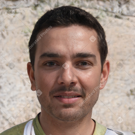 Joyful white young-adult male with short  brown hair and brown eyes