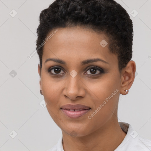 Joyful black young-adult female with short  brown hair and brown eyes