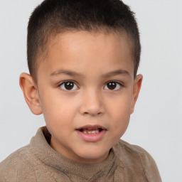 Joyful white child male with short  brown hair and brown eyes