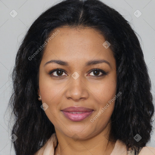 Joyful black young-adult female with long  black hair and brown eyes
