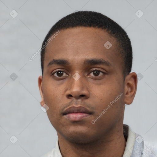 Neutral black young-adult male with short  black hair and brown eyes