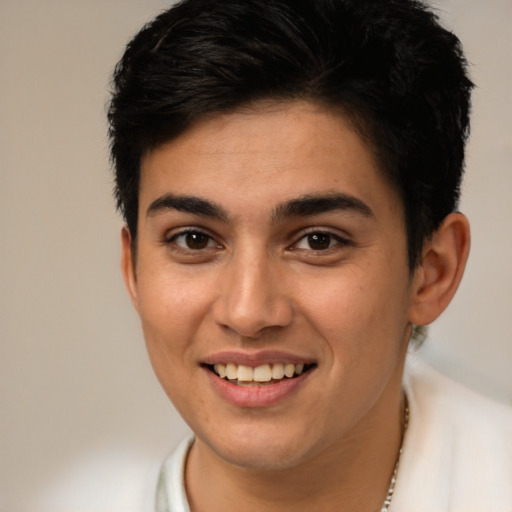 Joyful latino young-adult female with short  brown hair and brown eyes