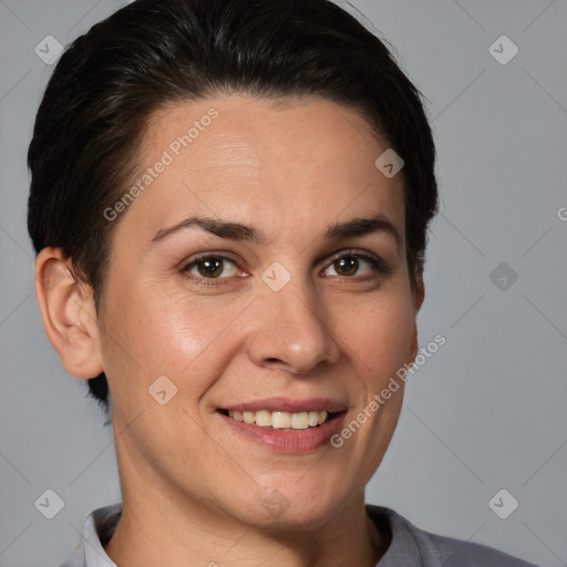 Joyful white adult female with short  brown hair and brown eyes