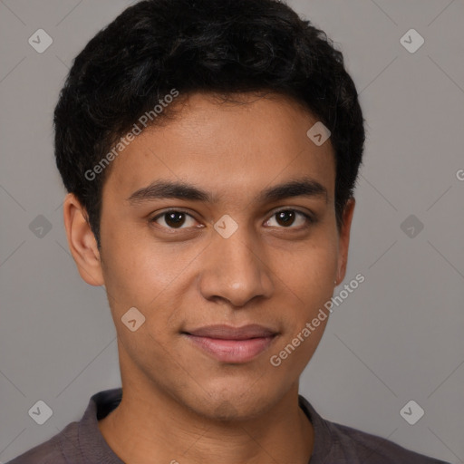 Joyful latino young-adult male with short  brown hair and brown eyes