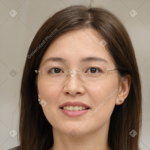 Joyful white adult female with long  brown hair and brown eyes