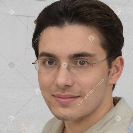 Joyful white adult male with short  brown hair and brown eyes