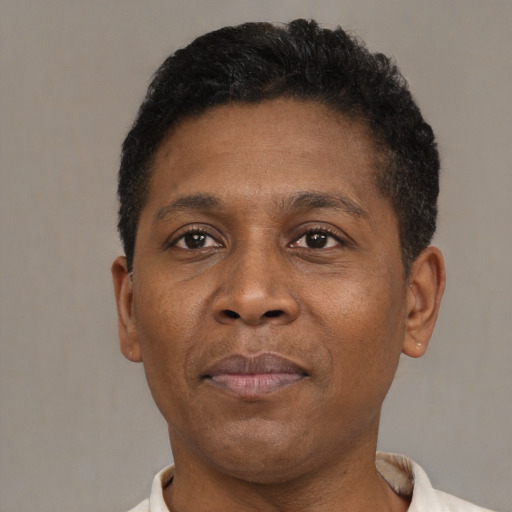 Neutral black adult male with short  brown hair and brown eyes