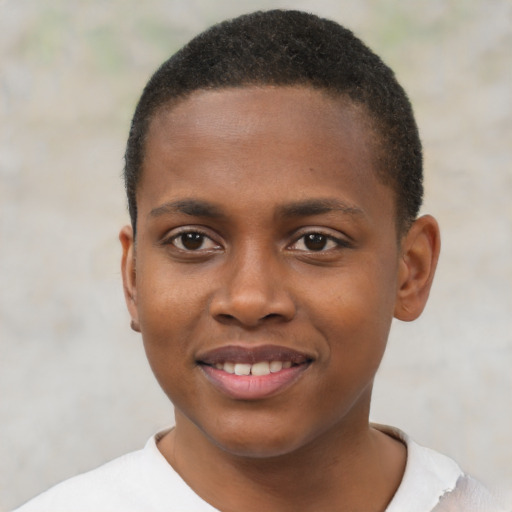 Joyful black young-adult male with short  brown hair and brown eyes