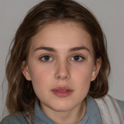 Neutral white young-adult female with medium  brown hair and grey eyes