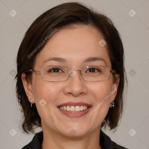 Joyful white adult female with medium  brown hair and brown eyes