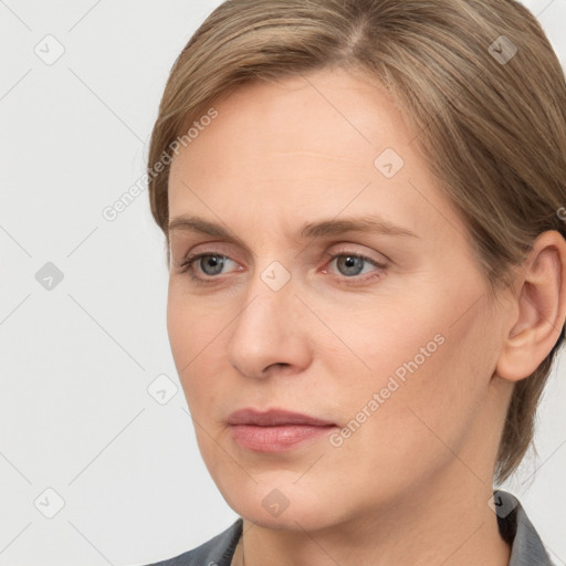 Neutral white young-adult female with medium  brown hair and grey eyes