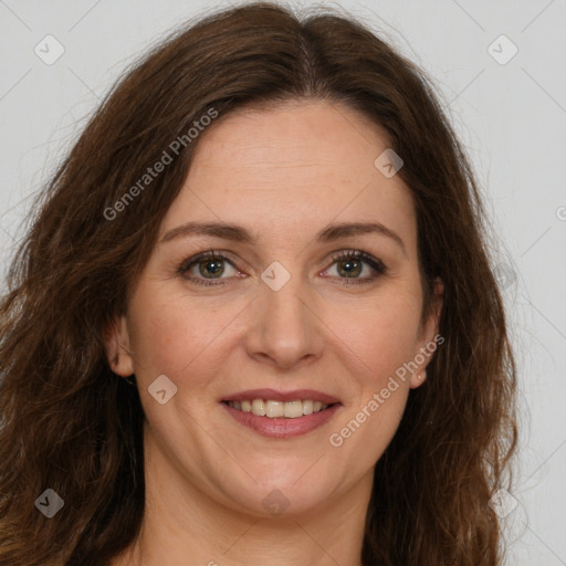 Joyful white young-adult female with long  brown hair and green eyes