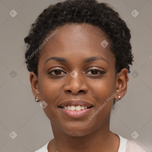 Joyful black young-adult female with short  black hair and brown eyes