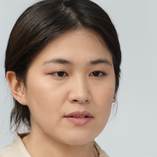 Neutral asian young-adult female with medium  brown hair and brown eyes
