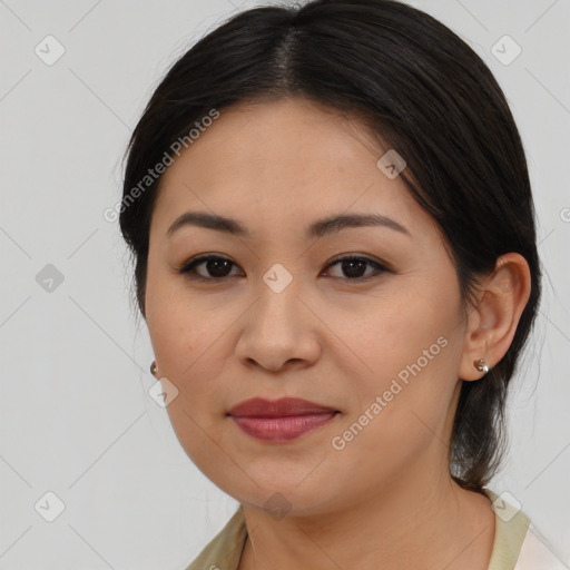 Joyful asian young-adult female with medium  brown hair and brown eyes