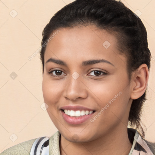 Joyful white young-adult female with short  brown hair and brown eyes