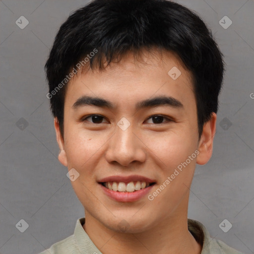 Joyful asian young-adult male with short  brown hair and brown eyes