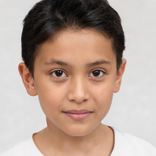 Joyful white child female with short  brown hair and brown eyes