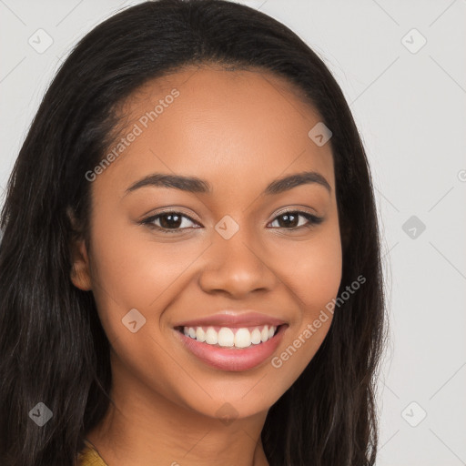 Joyful latino young-adult female with long  brown hair and brown eyes