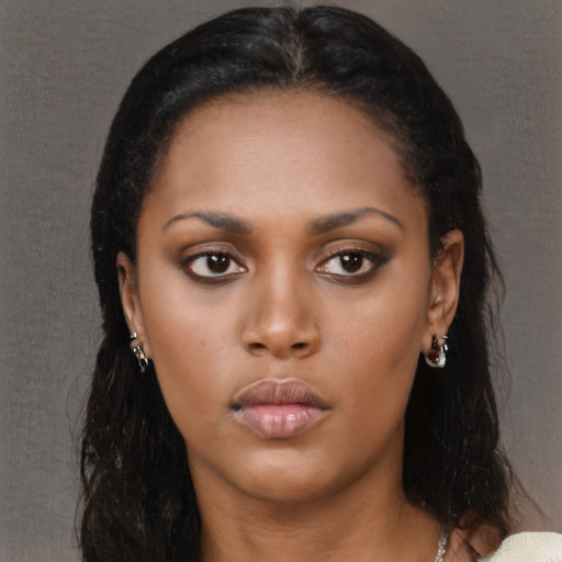 Neutral black young-adult female with long  brown hair and brown eyes