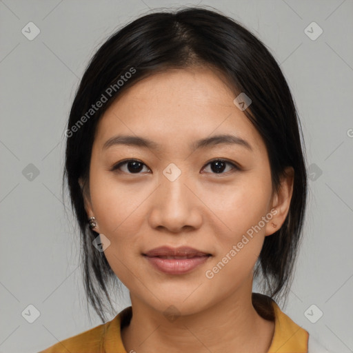 Joyful latino young-adult female with medium  black hair and brown eyes