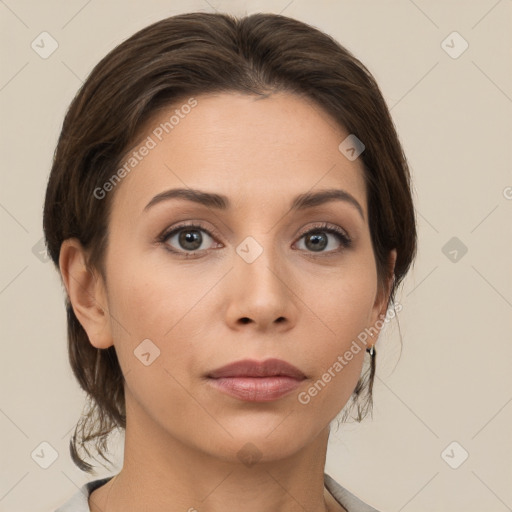 Neutral white young-adult female with medium  brown hair and brown eyes