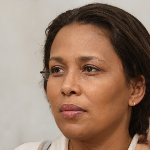 Neutral white adult female with medium  brown hair and brown eyes