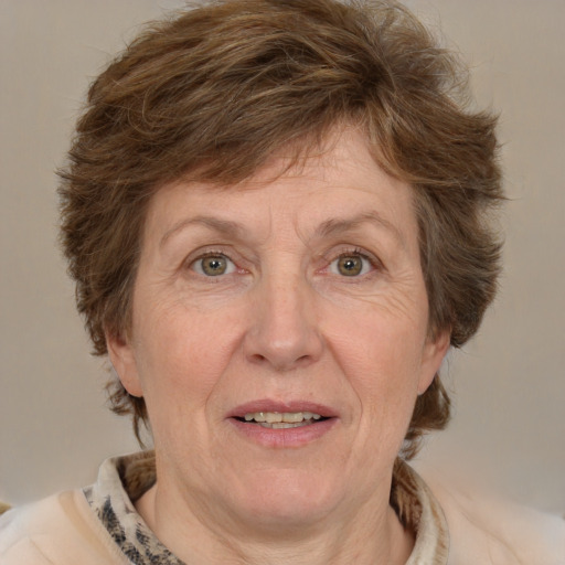 Joyful white middle-aged female with medium  brown hair and grey eyes