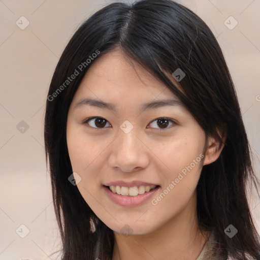 Joyful asian young-adult female with long  brown hair and brown eyes