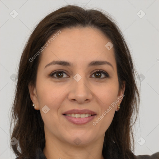 Joyful white young-adult female with long  brown hair and brown eyes