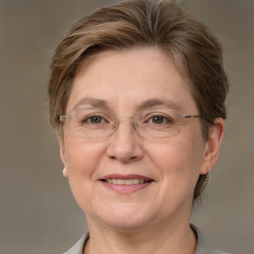 Joyful white middle-aged female with short  brown hair and brown eyes