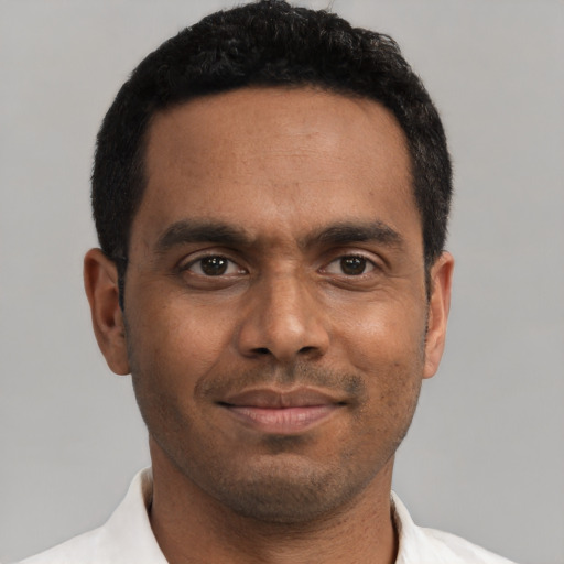 Neutral black young-adult male with short  black hair and brown eyes