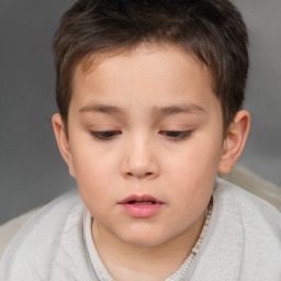 Neutral white child male with short  brown hair and brown eyes