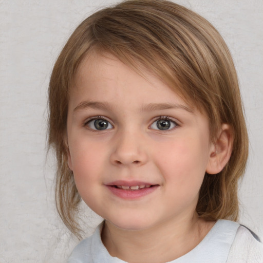 Joyful white child female with medium  brown hair and blue eyes