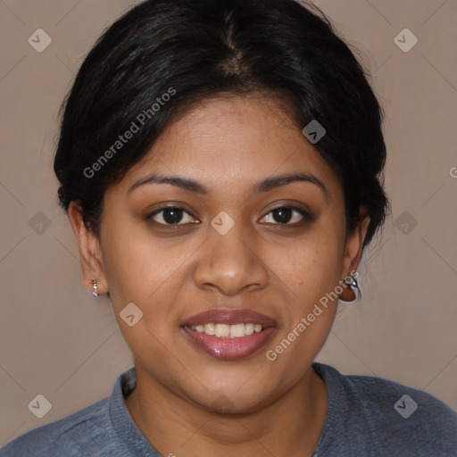 Joyful black young-adult female with medium  brown hair and brown eyes