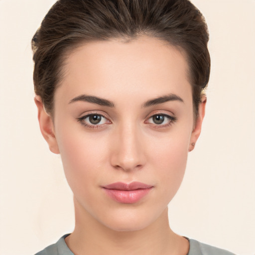 Neutral white young-adult female with short  brown hair and brown eyes