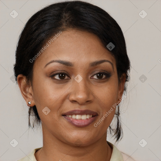 Joyful latino young-adult female with medium  brown hair and brown eyes