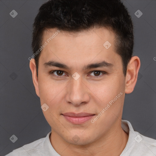 Joyful latino young-adult male with short  brown hair and brown eyes