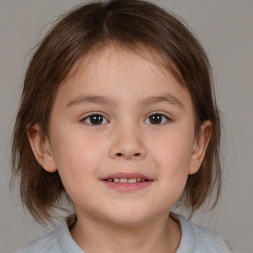 Joyful white child female with medium  brown hair and brown eyes