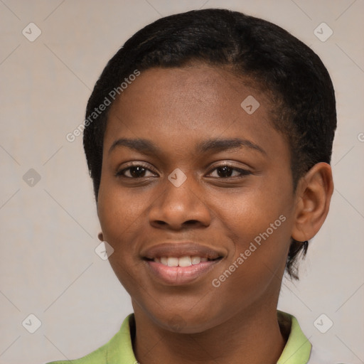 Joyful black young-adult female with short  black hair and brown eyes