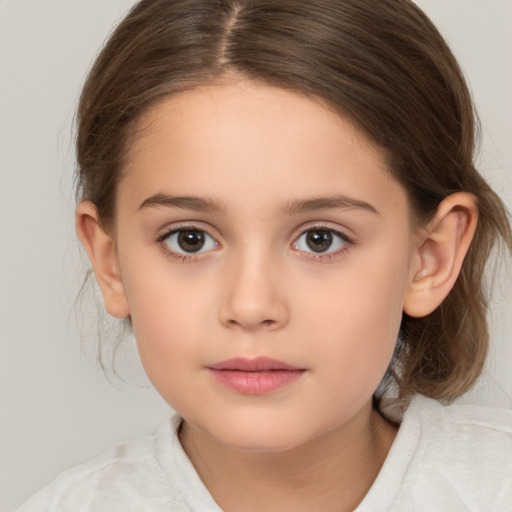 Neutral white child female with medium  brown hair and brown eyes