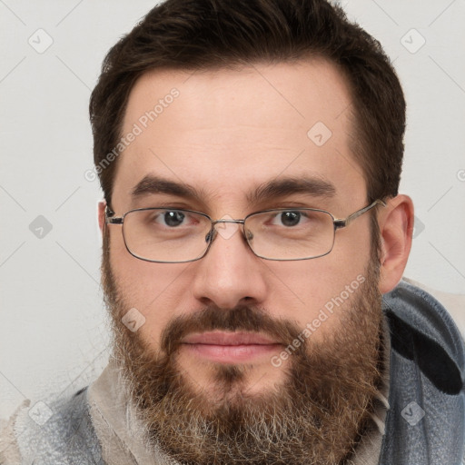 Joyful white young-adult male with short  brown hair and brown eyes