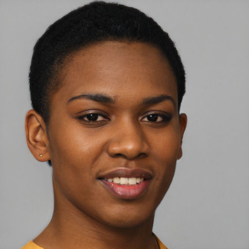Joyful black young-adult female with short  brown hair and brown eyes