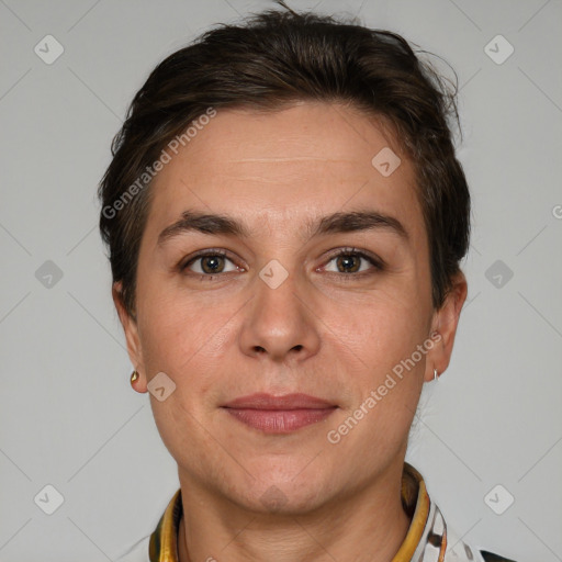 Joyful white adult female with short  brown hair and brown eyes