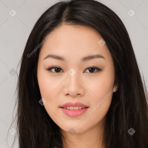 Joyful asian young-adult female with long  brown hair and brown eyes