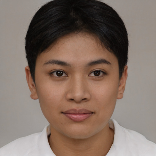 Joyful asian young-adult female with short  brown hair and brown eyes
