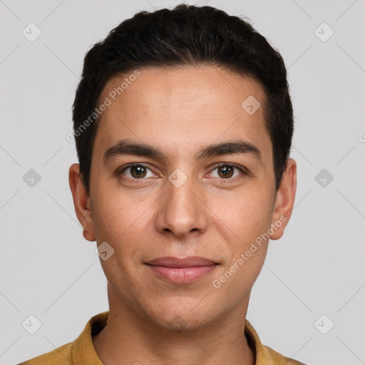 Joyful white young-adult male with short  brown hair and brown eyes