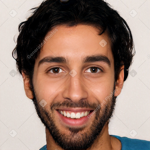 Joyful white young-adult male with short  black hair and brown eyes